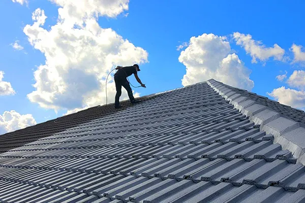 man on a ceramic roof
