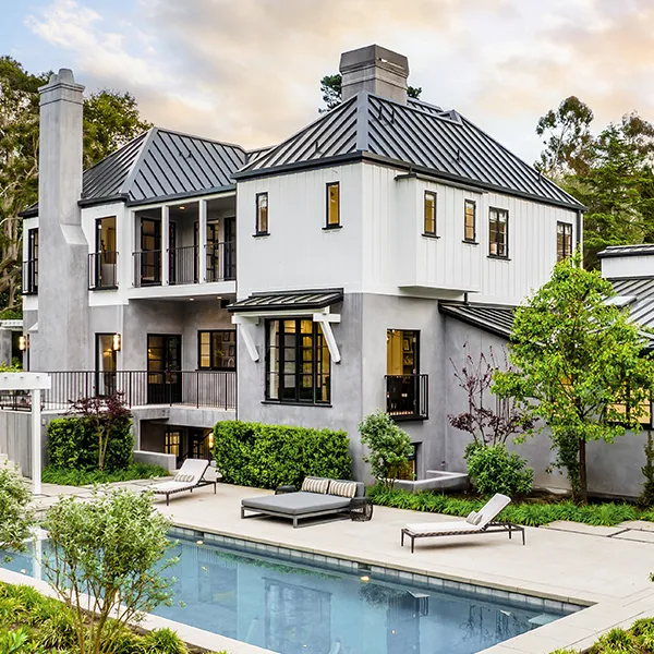 luxury home with specialty roof